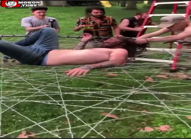 Video :It is absolutely not a good idea to jump on a barbed wire trampoline!